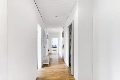 Ein Bett oder Betten in einem Zimmer der Unterkunft BEGE APARTMENTS Corporate Corner