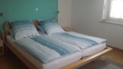 Ein Bett oder Betten in einem Zimmer der Unterkunft Ferienwohnung Pöttershof