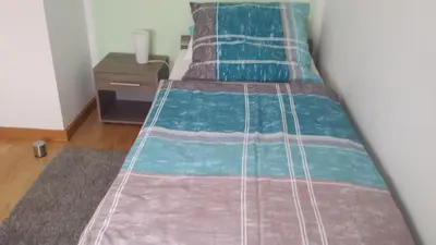 Ein Bett oder Betten in einem Zimmer der Unterkunft Ferienwohnung Pöttershof