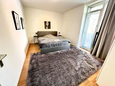 Ein Bett oder Betten in einem Zimmer der Unterkunft Spectecular Rhineview Fair Parking Luxury 12 Pers