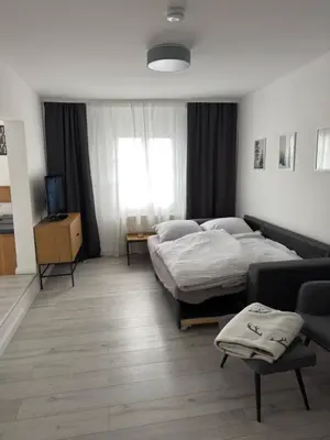 Ein Bett oder Betten in einem Zimmer der Unterkunft Ferienwohnung in der Wülfrather Altstadt