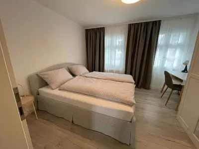 Ein Bett oder Betten in einem Zimmer der Unterkunft Ferienwohnung in der Wülfrather Altstadt