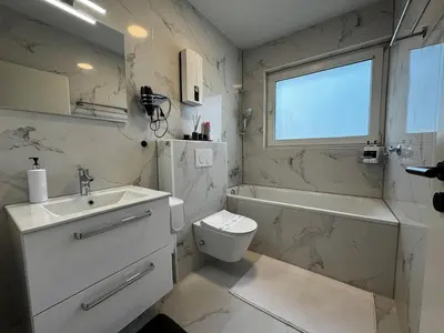 Ein Badezimmer in der Unterkunft Moderne Wohnung in Marl ideal für Familien und Monteure bis 6 Personen
