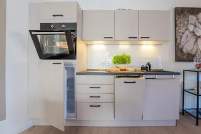 Küche/Küchenzeile in der Unterkunft Marisol Design Apartment mit eigenem Stellplatz