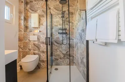 Ein Badezimmer in der Unterkunft Marisol Design Apartment mit eigenem Stellplatz