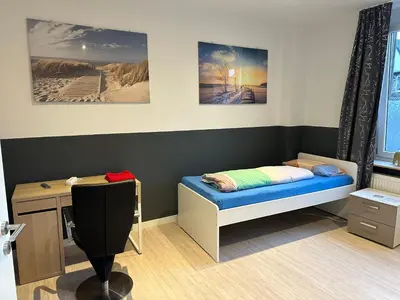 Ein Bett oder Betten in einem Zimmer der Unterkunft Modernes Apartment 8 in Dortmund
