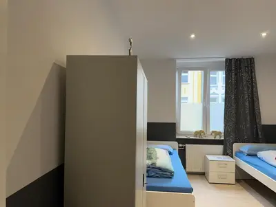 Ein Bett oder Betten in einem Zimmer der Unterkunft Modernes Apartment 8 in Dortmund