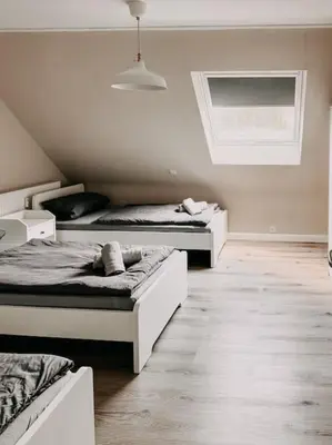 Ein Bett oder Betten in einem Zimmer der Unterkunft Wohnen im Ländereck Essen Mülheim Oberhausen BS2R