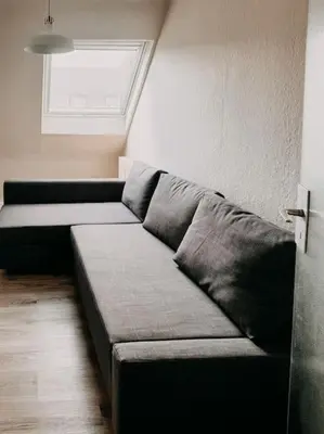 Ein Sitzbereich in der Unterkunft Wohnen im Ländereck Essen Mülheim Oberhausen BS2R