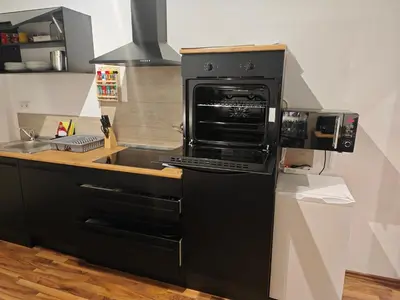 Küche/Küchenzeile in der Unterkunft Lüdenscheid Work and Stay 3 Schlafzimmer 6 Betten Küche Bad Innenstadt
