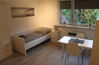 Ein Bett oder Betten in einem Zimmer der Unterkunft Gemütliche stilvolle 1 Raumwohnung