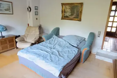 Ein Bett oder Betten in einem Zimmer der Unterkunft Siedlungshaus im Grünen