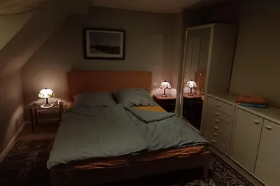 Ein Bett oder Betten in einem Zimmer der Unterkunft Siedlungshaus im Grünen