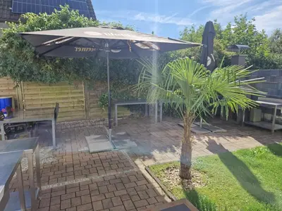 Ein Garten an der Unterkunft Bei Pina - Schöne Dachgeschosswohnung nahe Düsseldorf