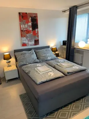 Ein Bett oder Betten in einem Zimmer der Unterkunft studio 59 , Boxspringbett, TV, Balkon, Loggia, Küche, Bad, W-lan
