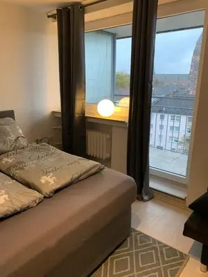 Ein Bett oder Betten in einem Zimmer der Unterkunft studio 59 , Boxspringbett, TV, Balkon, Loggia, Küche, Bad, W-lan