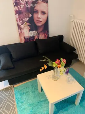 Ein Sitzbereich in der Unterkunft studio 59 , Boxspringbett, TV, Balkon, Loggia, Küche, Bad, W-lan