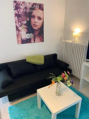 Ein Sitzbereich in der Unterkunft studio 59 , Boxspringbett, TV, Balkon, Loggia, Küche, Bad, W-lan
