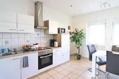 Küche/Küchenzeile in der Unterkunft Top Apartmentwohnungen Heiligenhaus