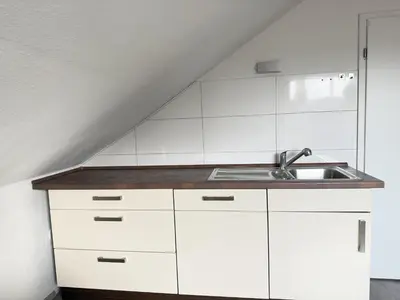 Küche/Küchenzeile in der Unterkunft Helle und Charmante Dachgeschosswohnung in Top-Lage