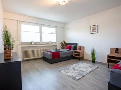 Ein Sitzbereich in der Unterkunft Serviceroom24 - Apartment 2 in Gladbeck WLAN - Smart-TV - 24-7 Check-in und Küche