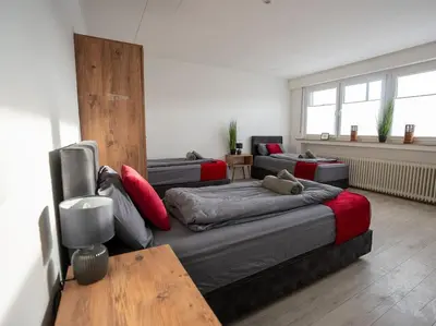 Ein Sitzbereich in der Unterkunft Serviceroom24 - Apartment 2 in Gladbeck WLAN - Smart-TV - 24-7 Check-in und Küche
