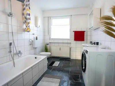 Ein Badezimmer in der Unterkunft Serviceroom24 - Apartment 2 in Gladbeck WLAN - Smart-TV - 24-7 Check-in und Küche