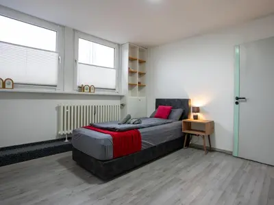 Ein Bett oder Betten in einem Zimmer der Unterkunft Serviceroom24 - Apartment 4 in Gladbeck WLAN - Smart-TV - 24-7 Check-in und Küche