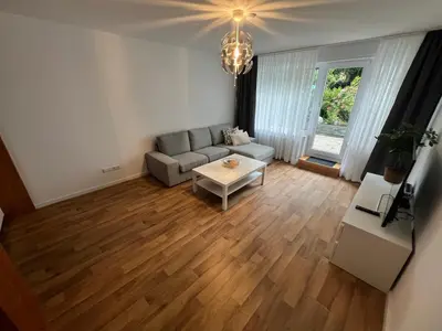 Ein Sitzbereich in der Unterkunft Messenahe Moderne Zwei-Zimmer-Wohnung 42qm