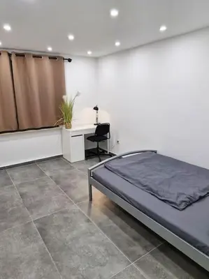 Ein Bett oder Betten in einem Zimmer der Unterkunft 3-Zimmer Wohnung in Ratingen - Nähe Düsseldorf Messe & Flughafen