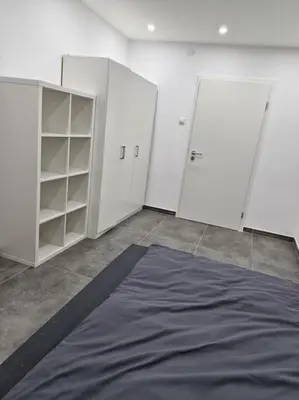 Ein Bett oder Betten in einem Zimmer der Unterkunft 3-Zimmer Wohnung in Ratingen - Nähe Düsseldorf Messe & Flughafen