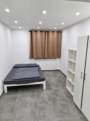 Ein Bett oder Betten in einem Zimmer der Unterkunft 3-Zimmer Wohnung in Ratingen - Nähe Düsseldorf Messe & Flughafen