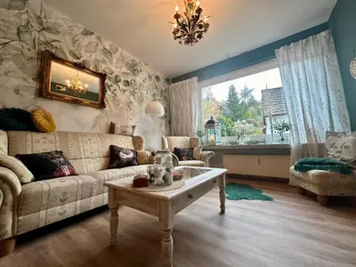 Ein Sitzbereich in der Unterkunft Ferienwohnung Am Schlossberg