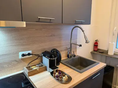 Küche/Küchenzeile in der Unterkunft Messe Essen, Modernes Apartment mit Küche, Balkon & Self-Check-in