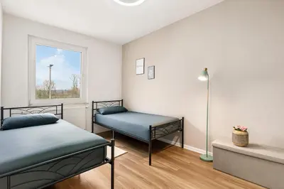 Ein Bett oder Betten in einem Zimmer der Unterkunft Smart Home - Near Essen, Oberhausen, Bottrop - Perfect for 6 Guests! Balcony - Netflix - Smart TV