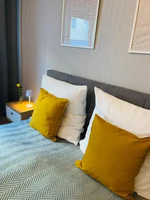 Ein Bett oder Betten in einem Zimmer der Unterkunft Sunny Appartement