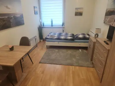 Ein Sitzbereich in der Unterkunft Monteurwohnung Nähe MoviePark