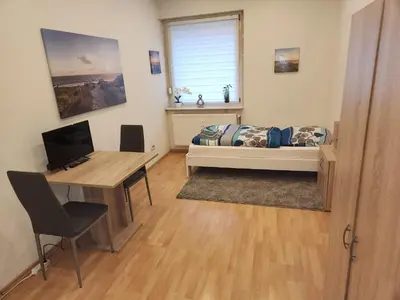 Ein Sitzbereich in der Unterkunft Monteurwohnung Nähe MoviePark