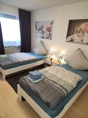 Ein Bett oder Betten in einem Zimmer der Unterkunft Monteurwohnung Marl Brassert - 1OGM