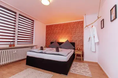 Ein Bett oder Betten in einem Zimmer der Unterkunft brick & cozy - City - Netflix - Wifi - 4 Person