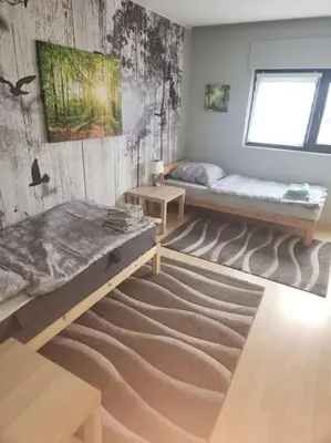 Ein Bett oder Betten in einem Zimmer der Unterkunft Monteurwohnung in Marl - Lipper 27 - DG