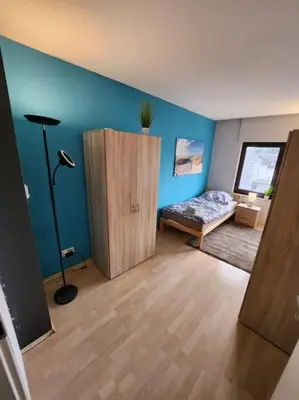 Ein Bett oder Betten in einem Zimmer der Unterkunft Monteurwohnung in Marl - Lipper 27 - DG