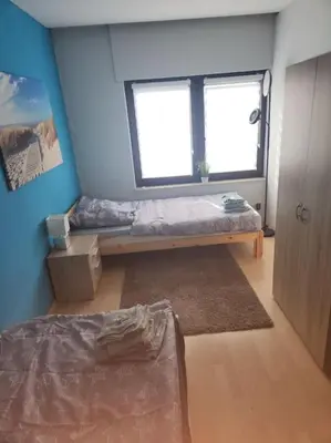 Ein Bett oder Betten in einem Zimmer der Unterkunft Monteurwohnung in Marl - Lipper 27 - DG