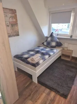Ein Bett oder Betten in einem Zimmer der Unterkunft Monteurwohnung in Marl - Kamp 13 - 2OGM