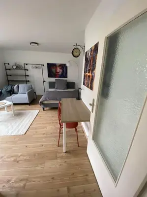 Ein Sitzbereich in der Unterkunft Moderne Wohnung in Toplage