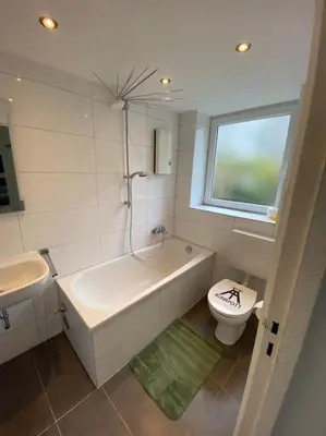 Ein Badezimmer in der Unterkunft Moderne Wohnung in Toplage