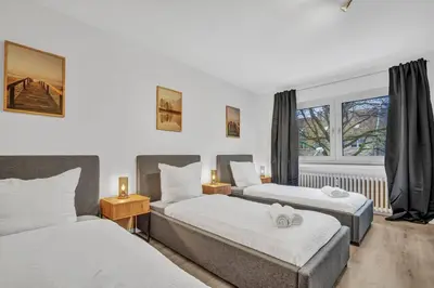 Ein Bett oder Betten in einem Zimmer der Unterkunft Schöne Essen Wohnung - 5 Betten