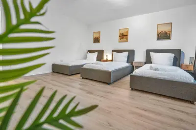 Ein Bett oder Betten in einem Zimmer der Unterkunft Schöne Essen Wohnung - 5 Betten