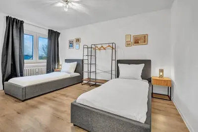 Ein Bett oder Betten in einem Zimmer der Unterkunft Schöne Essen Wohnung - 5 Betten