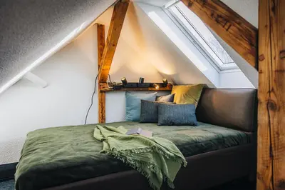 Ein Bett oder Betten in einem Zimmer der Unterkunft Atelier Bochum
